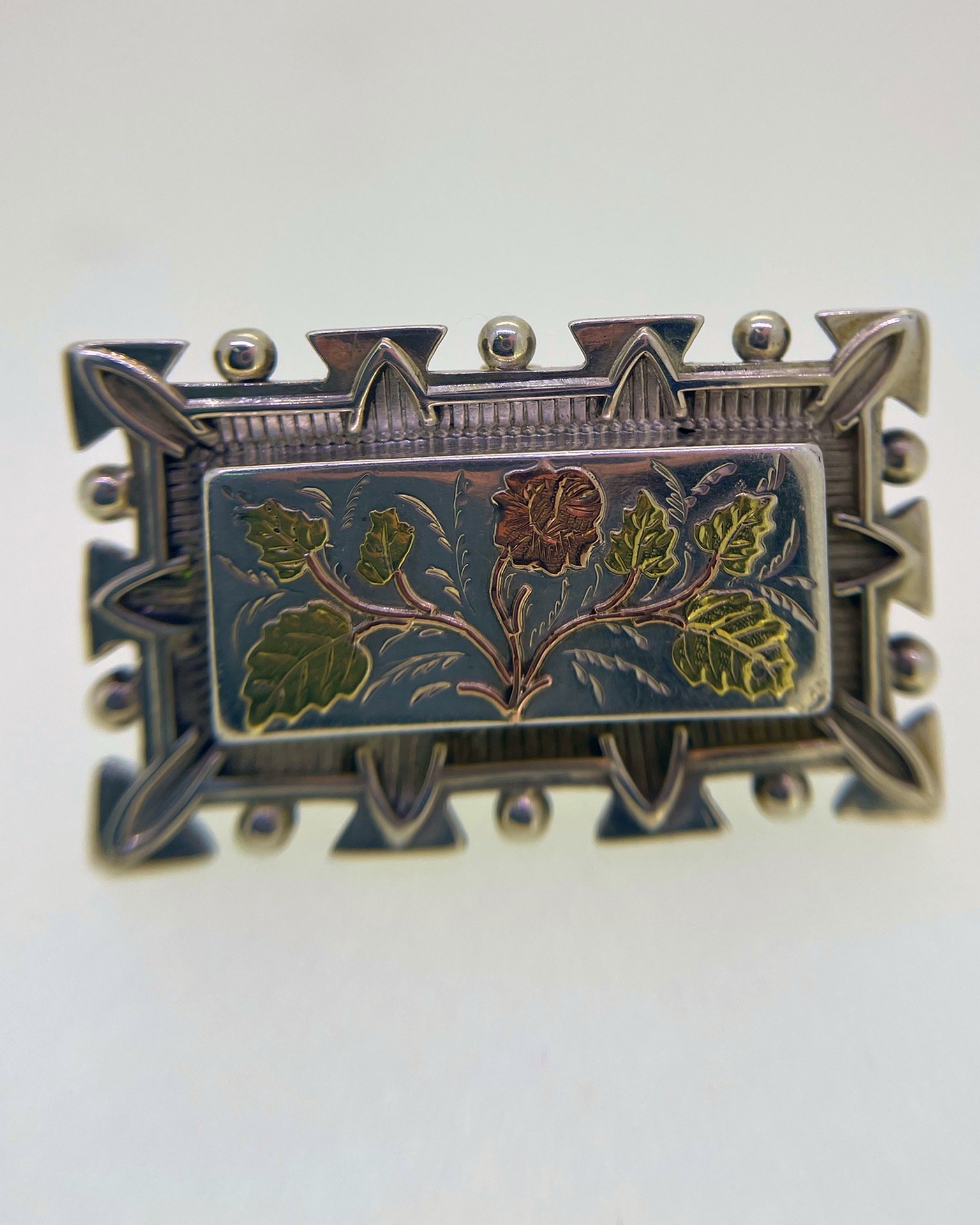 Antique silver floral mourning brooch, A floral mourning brooch in antique silver.