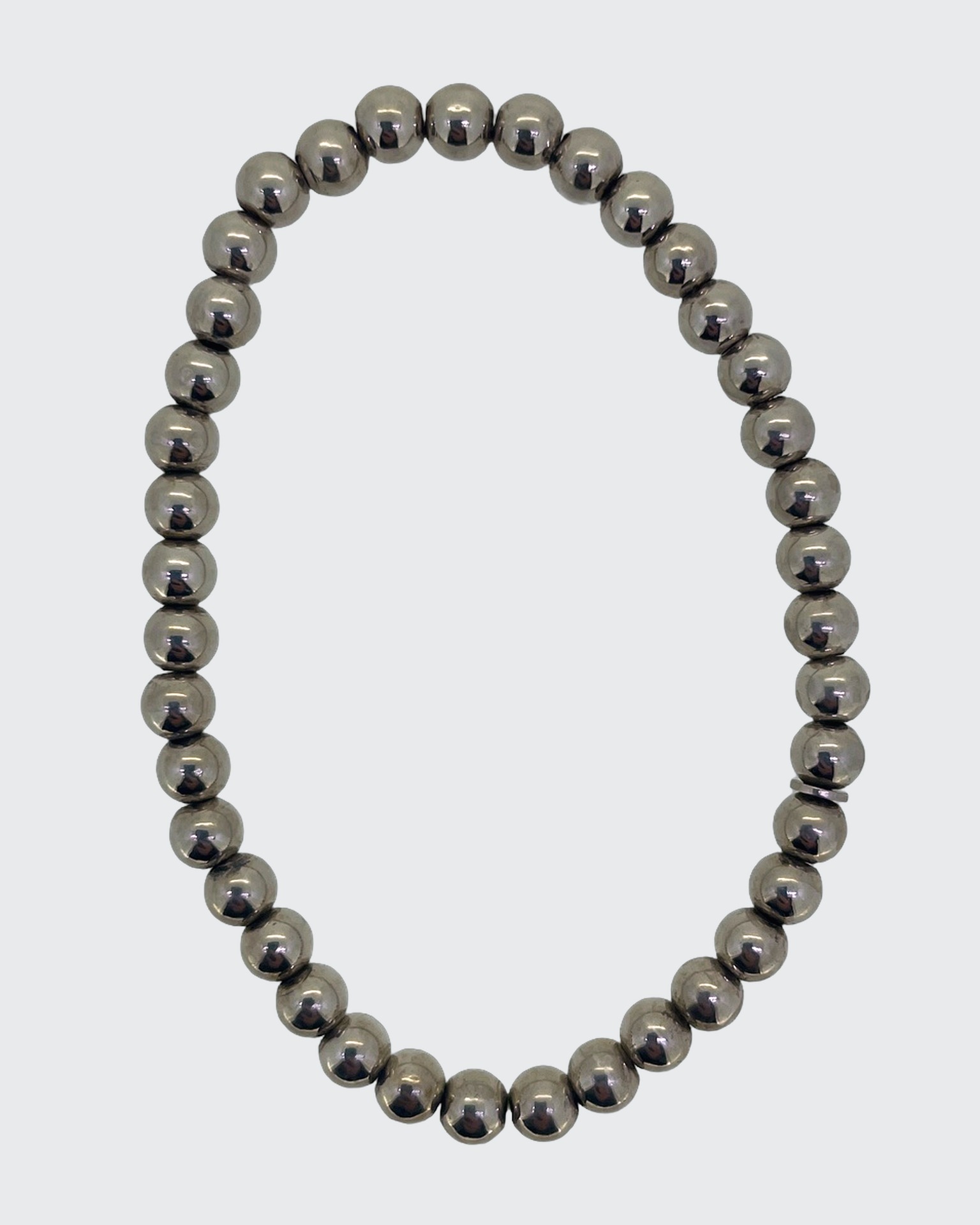 Silver Ball Bead Stretch Bracelet, Polished silver-tone ball bead stretch bracelet.