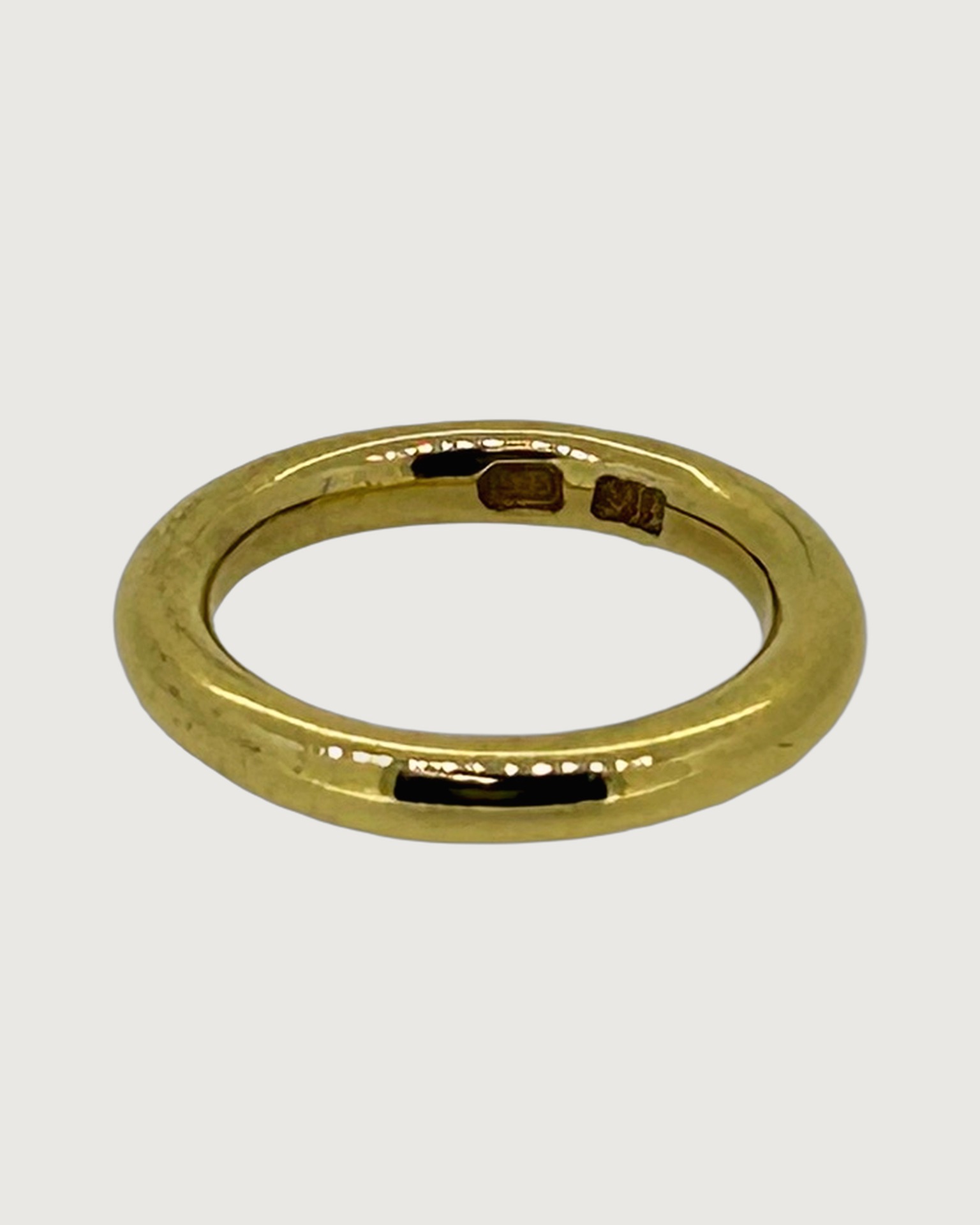 Silver gilt band ring, A plain polished ring with a rounded profile.
