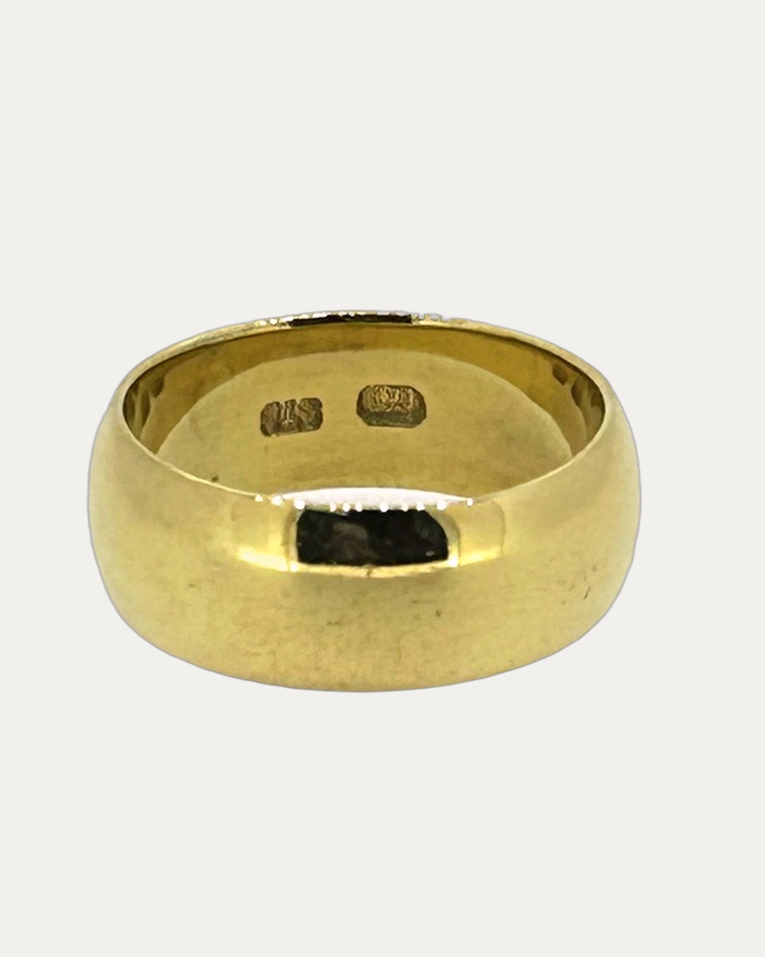 Silver gilt wide band ring, A polished wide band ring with a simple rounded form.