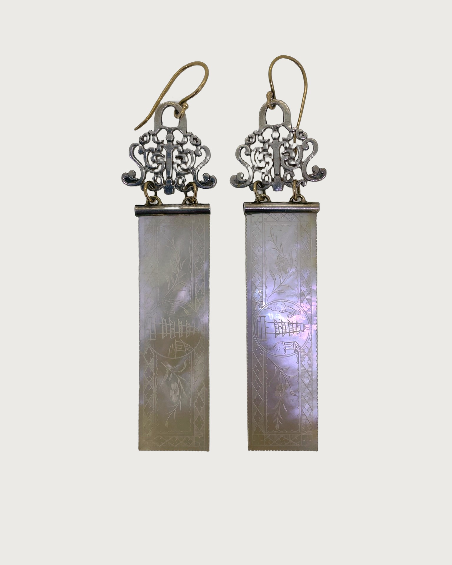 Silver and 9-carat Yellow Gold Mother-of-Pearl Earrings, Long drop earrings with engraved Mother-of-Pearl plaques.