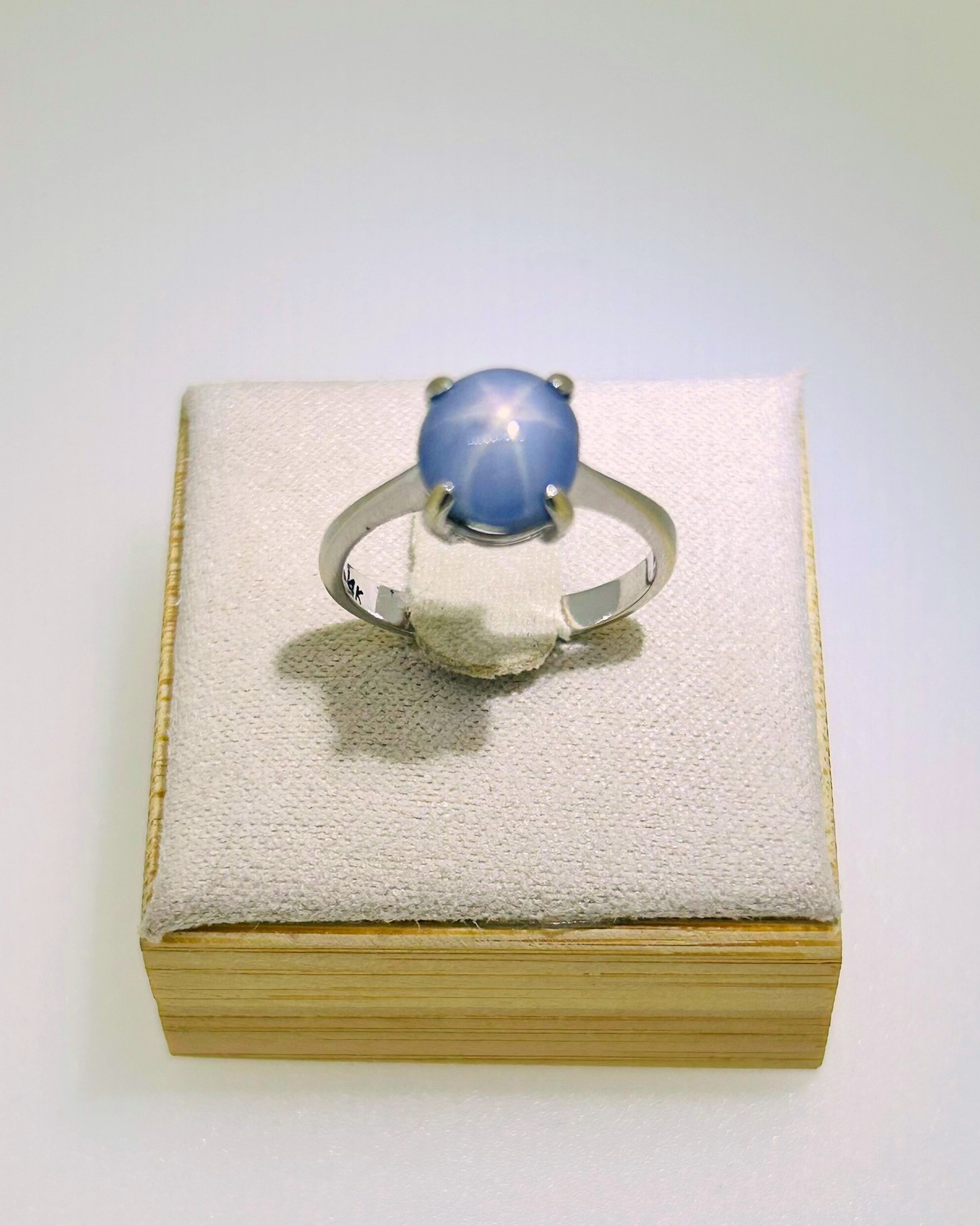 14-carat White Gold Pale Blue Star Sapphire Ring, A pale blue star sapphire ring in white gold.
