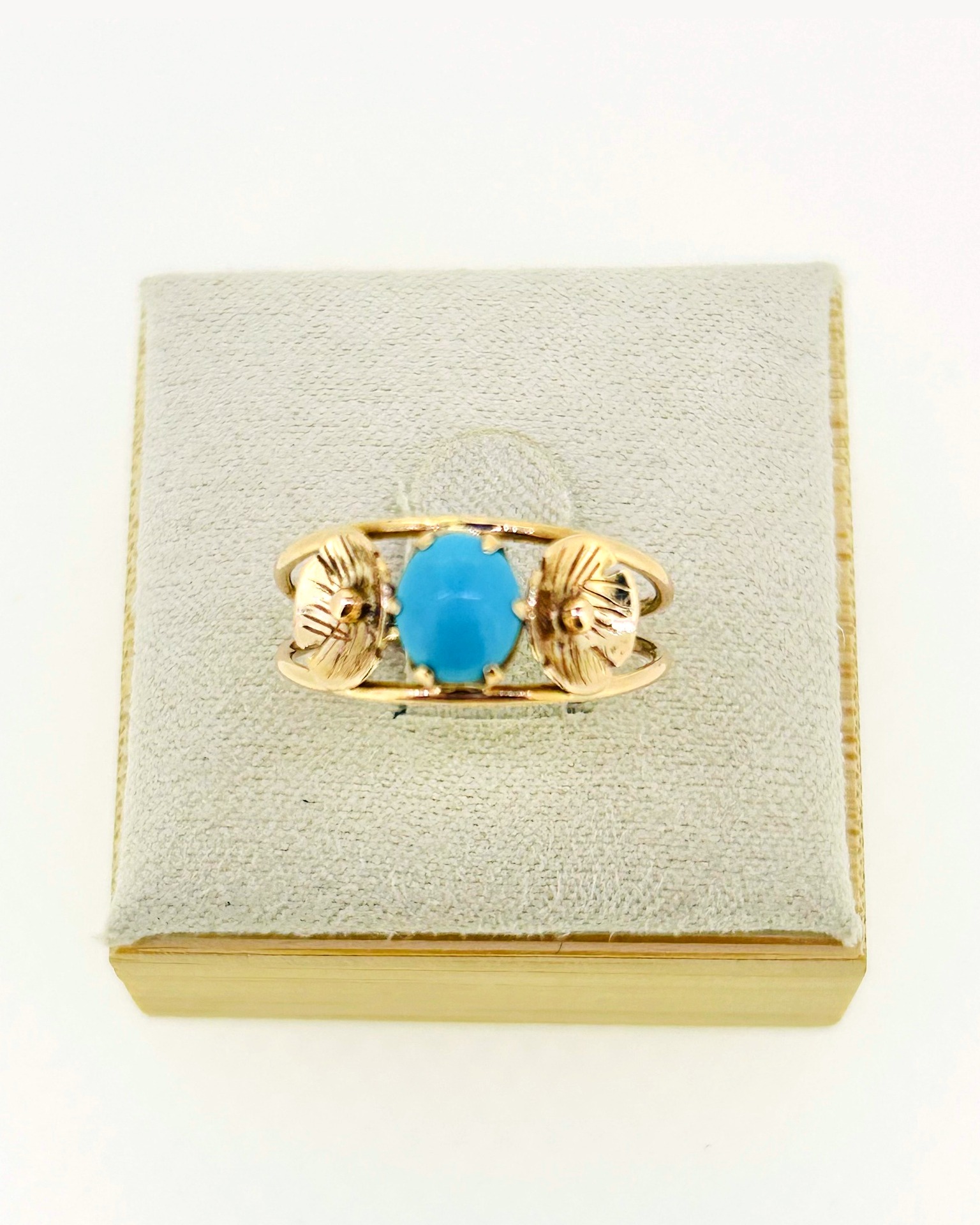 14-carat Yellow Gold Turquoise Flower Ring, A flower-form ring with a turquoise centre stone.