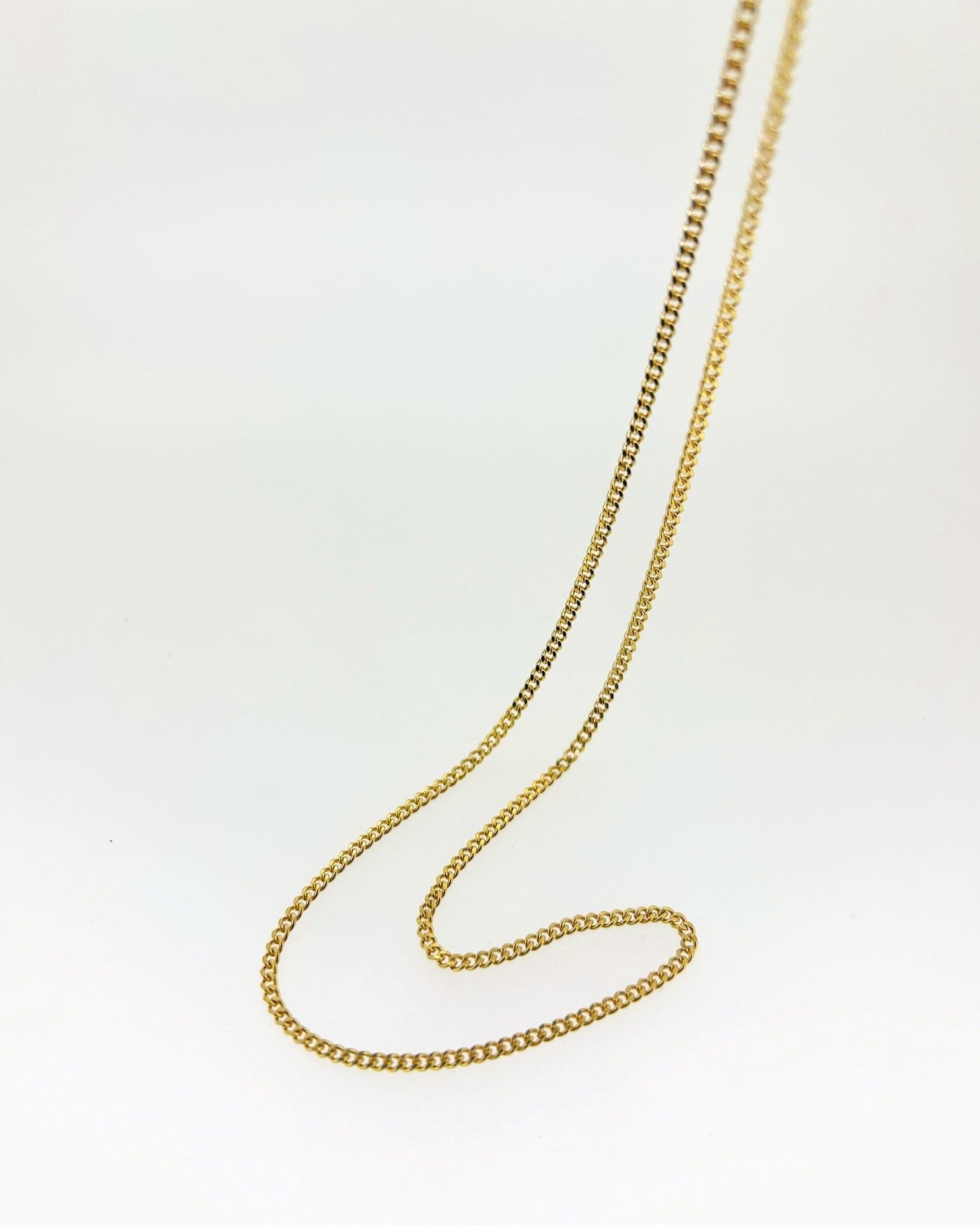 9-carat Yellow Gold Curb Chain 62 cm, Weight: 7.4 g.