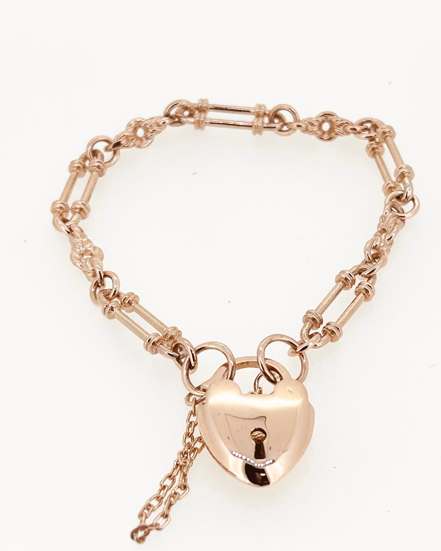 9-carat Rose Gold Fancy Link Padlock Bracelet, Fancy link bracelet with padlock clasp. Weight: 17 g.