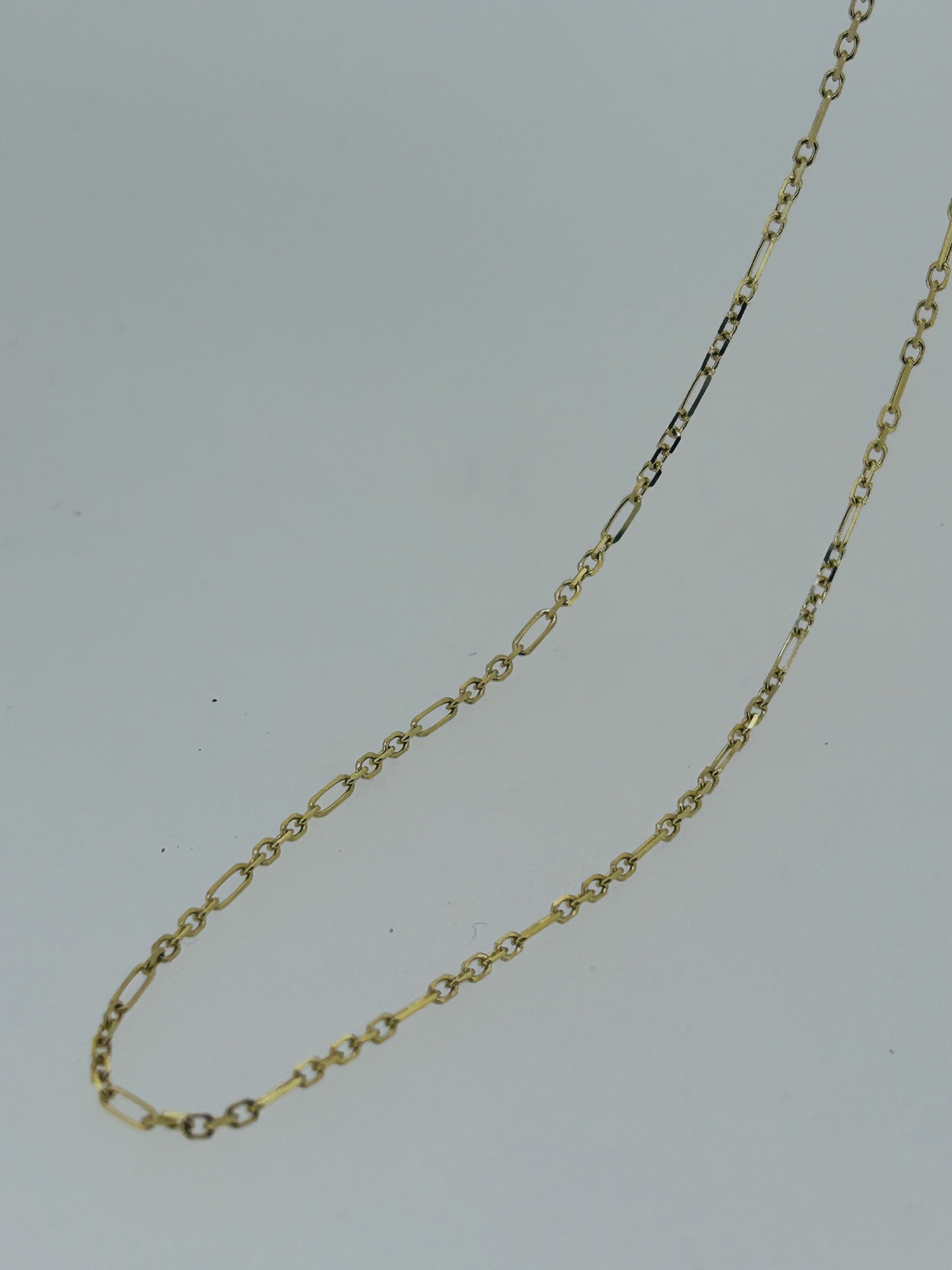 9-carat Yellow Gold 1.4 mm Figaro Chain 45 cm, A fine 9-carat yellow gold 45cm diamond cut Figaro chain