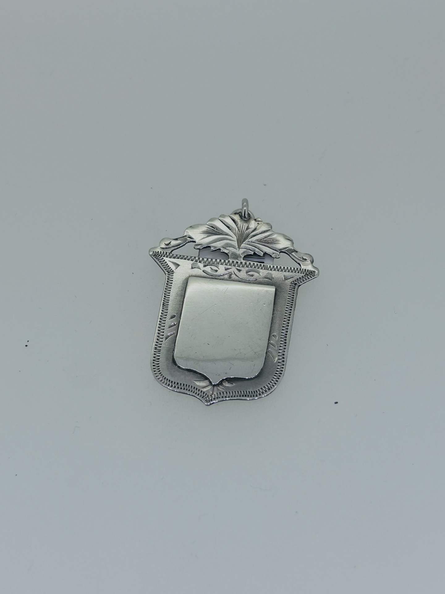 Silver Vintage Shield Medal Pendant, Decorative vintage-style silver medal pendant.