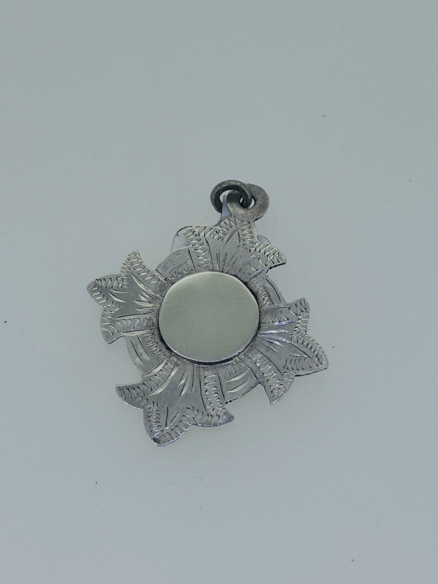 Silver vintage medal pendant, Silver vintage medal pendant with engraved border.