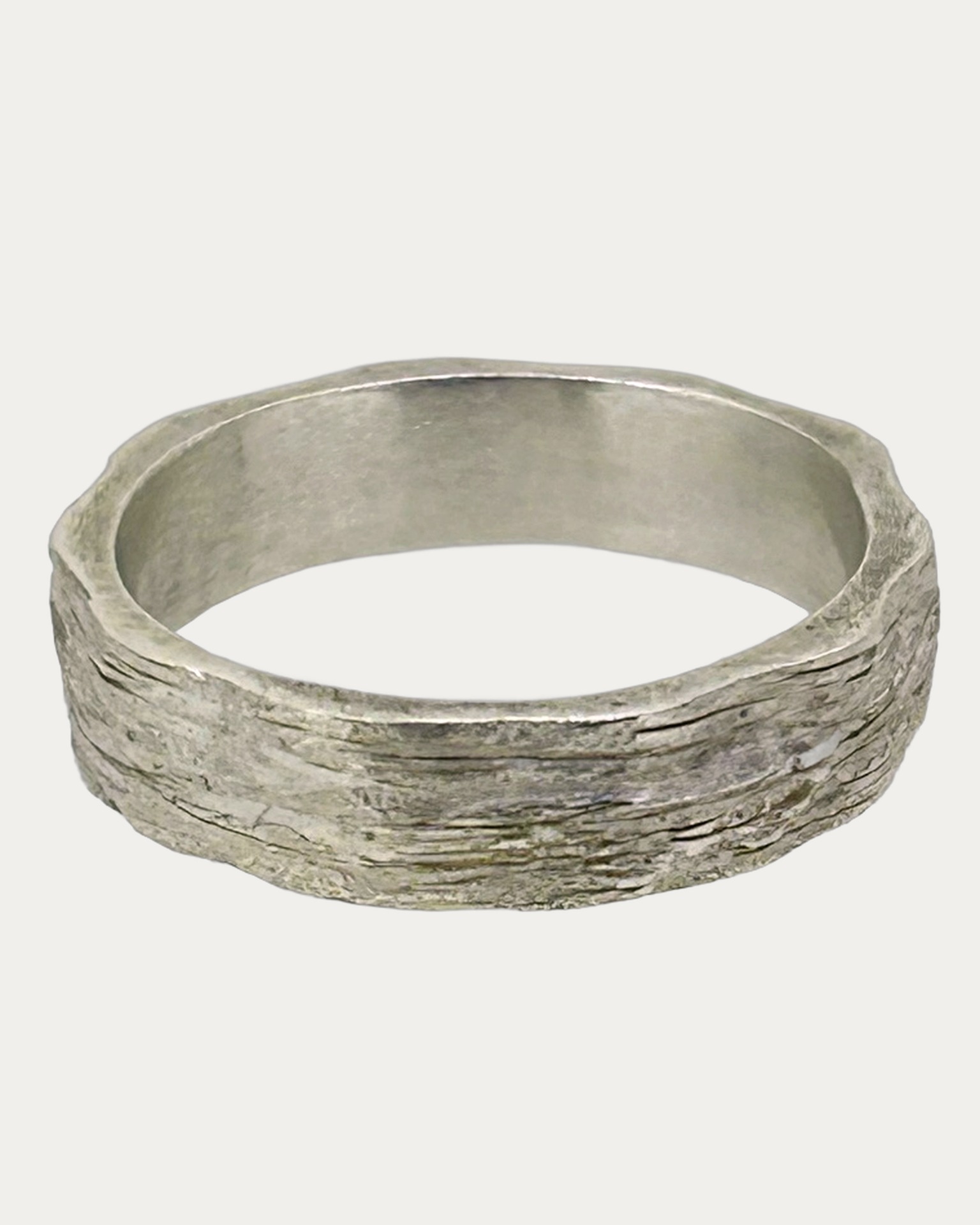 Textured Silver Ring, A textured silver ring. Weight: 4.6 g.