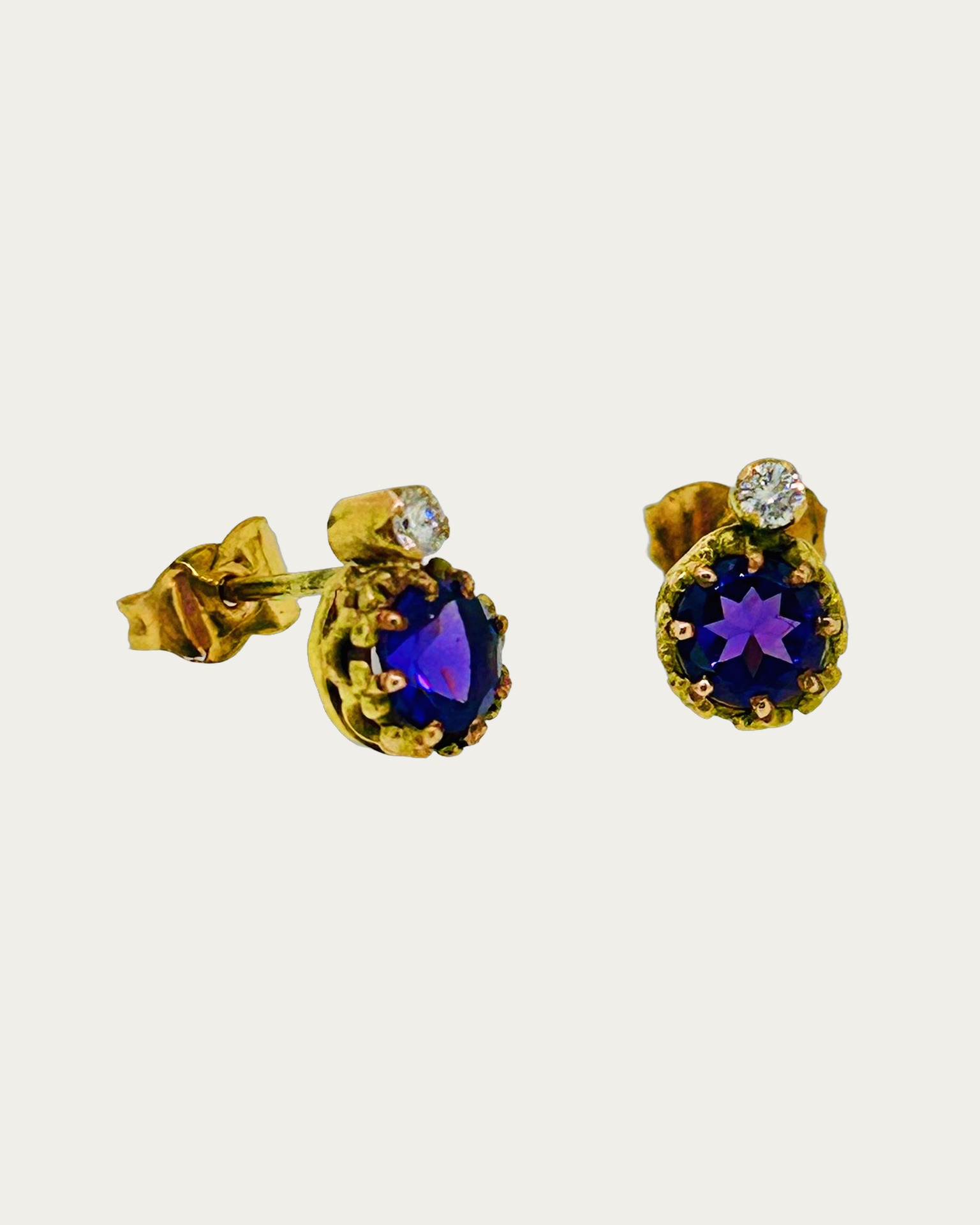 9-carat Rose Gold Amethyst and Diamond Stud Earrings, Stud earrings with amethyst and diamond accents.