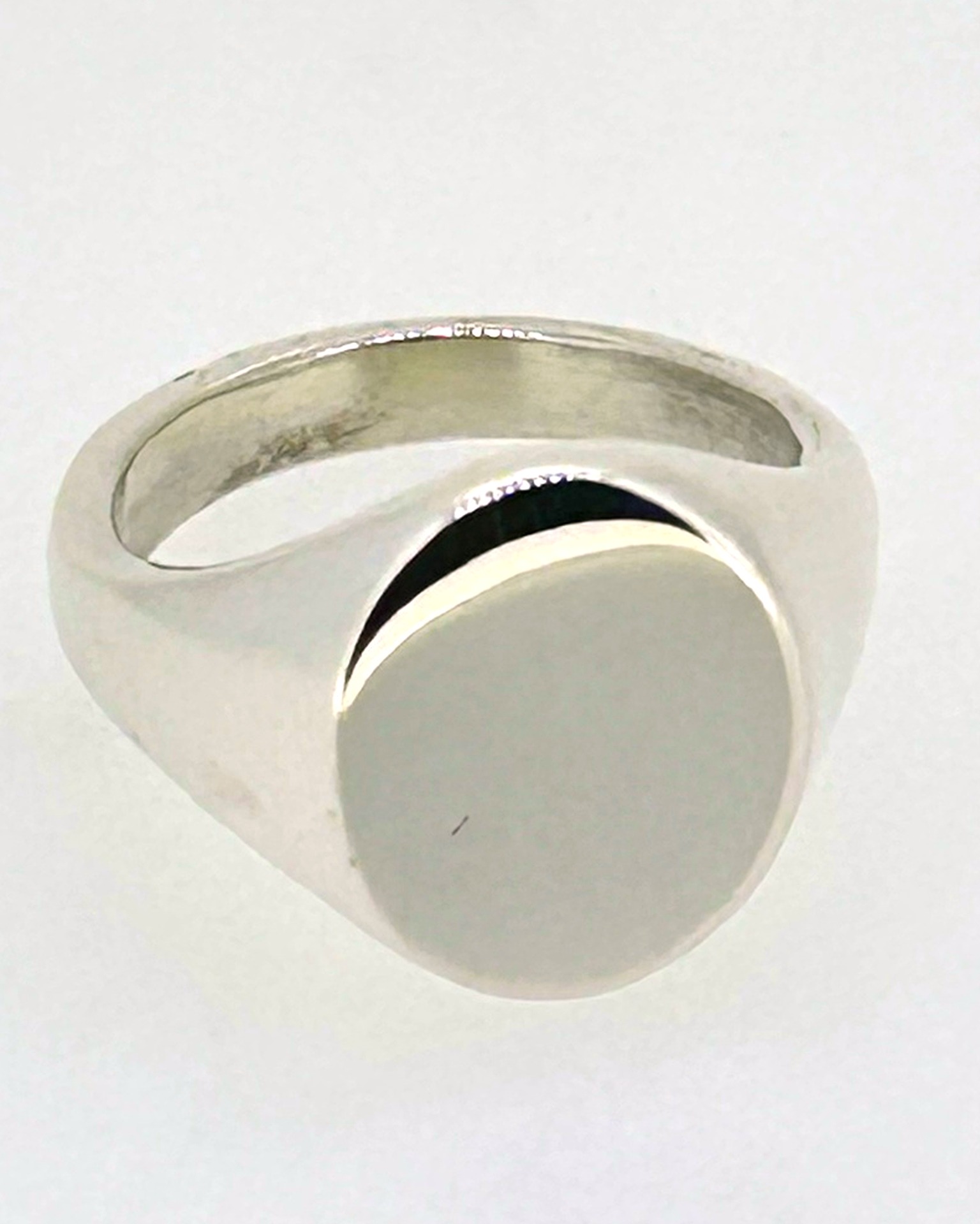 Small square engraved signet ring, A polished signet ring with a square engraved face.